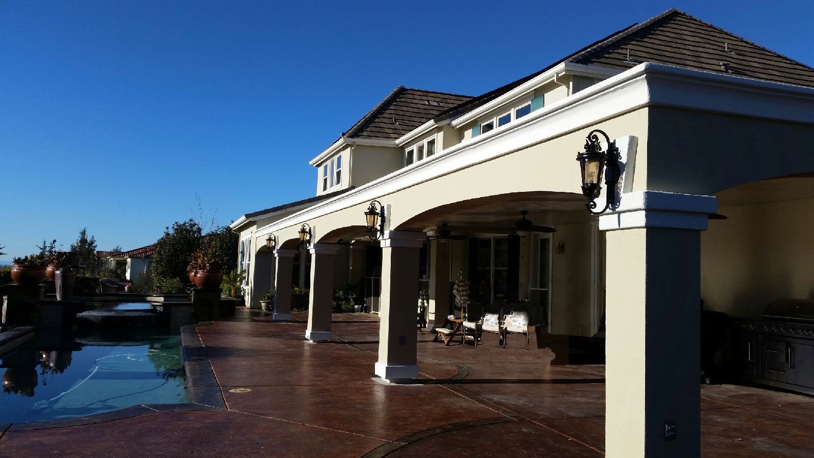 Detailed craftsmanship on a bespoke patio cover with decorative trim installed in Roseville, CA