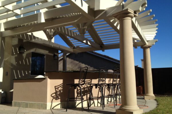 Base detail of a fiberglass column mounted on concrete patio slab installed in Auburn, CA