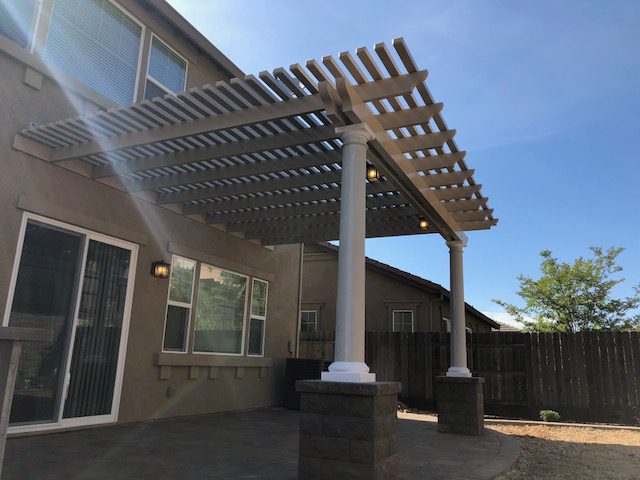 Classic round fiberglass columns installed on a backyard patio installed in Vacaville, CA
