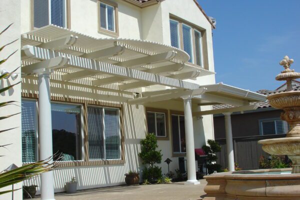 Side angle of combination patio roof system highlighting clean lines and durable material installed in Rancho Cordova, CA