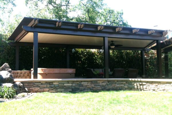 Installation of combination patio roof showing metal posts and lattice panels installed in Auburn, CA