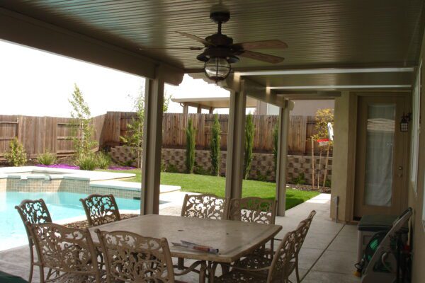 solid patio cover with flat aluminum posts in Roseville, CA