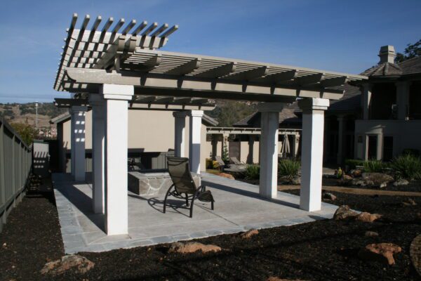 lattice patio cover installed with stucco columns installed in Lincoln, CA