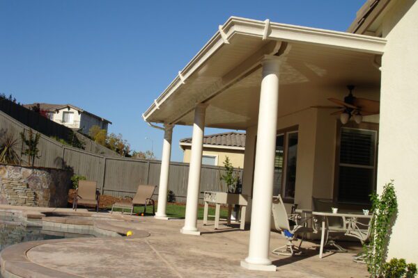 solid patio cover with round stucco columns in Lincoln, CA