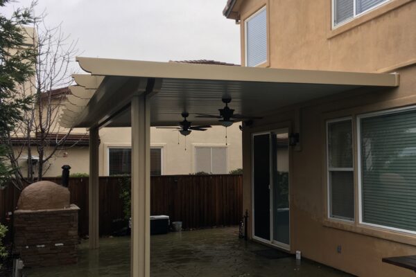 solid patio cover with flat aluminum posts in Roseville, CA