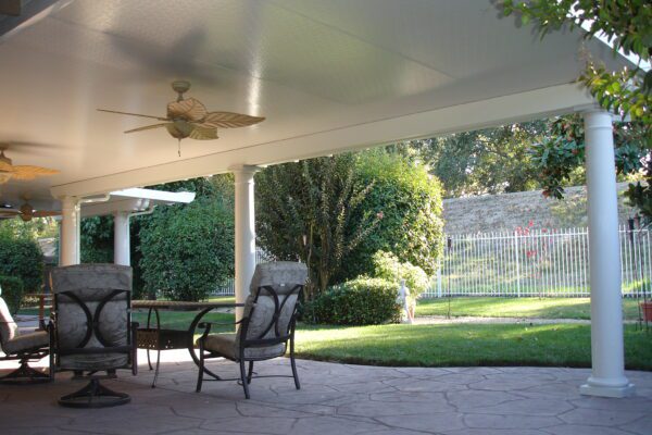 Solid Patio cover with custom round columns installed in Roseville, CA