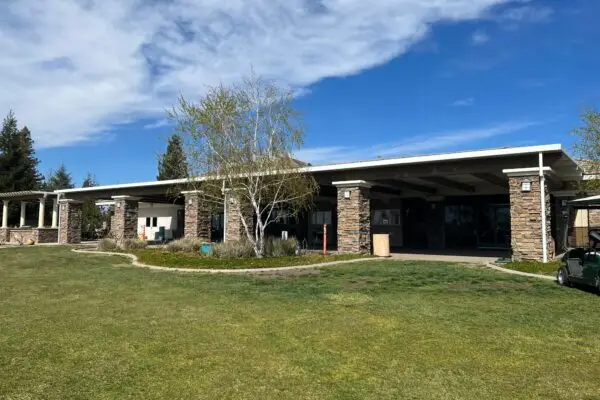 Wide shot of commercial patio cover project showing multiple workstation in Roseville, CA