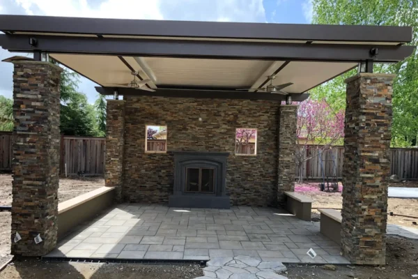 Solid Patio cover with flat aluminum posts installed in Plumas Lakes, CA