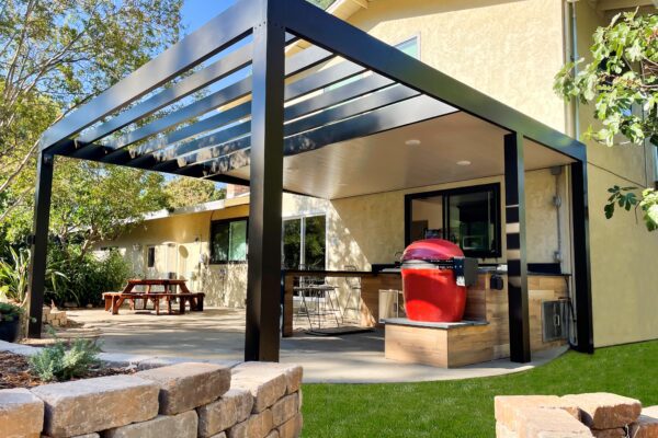 Sleek square aluminum post providing support for louvered roof installed in Granite Bay, CA